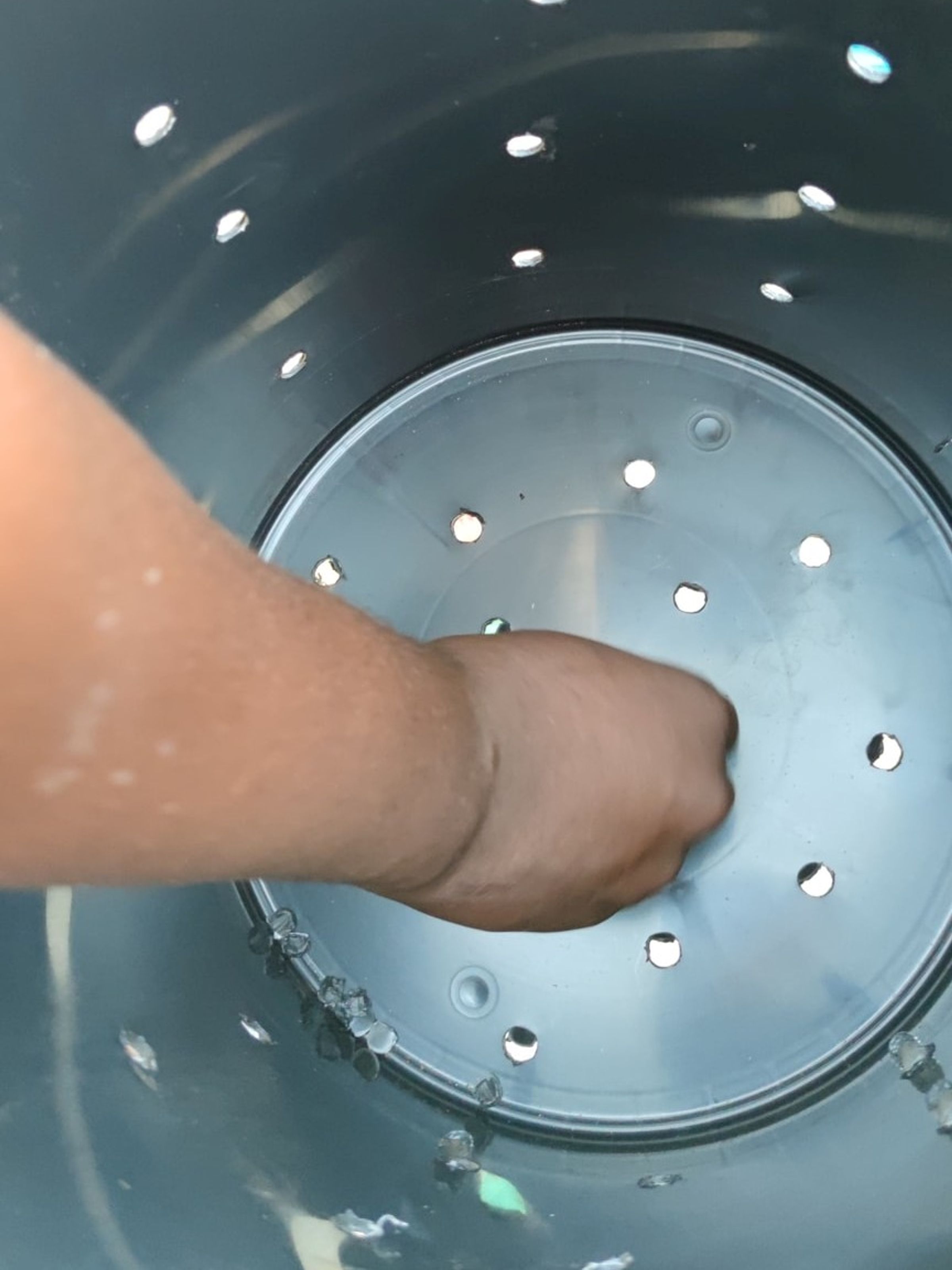 Removing all debris from the holes