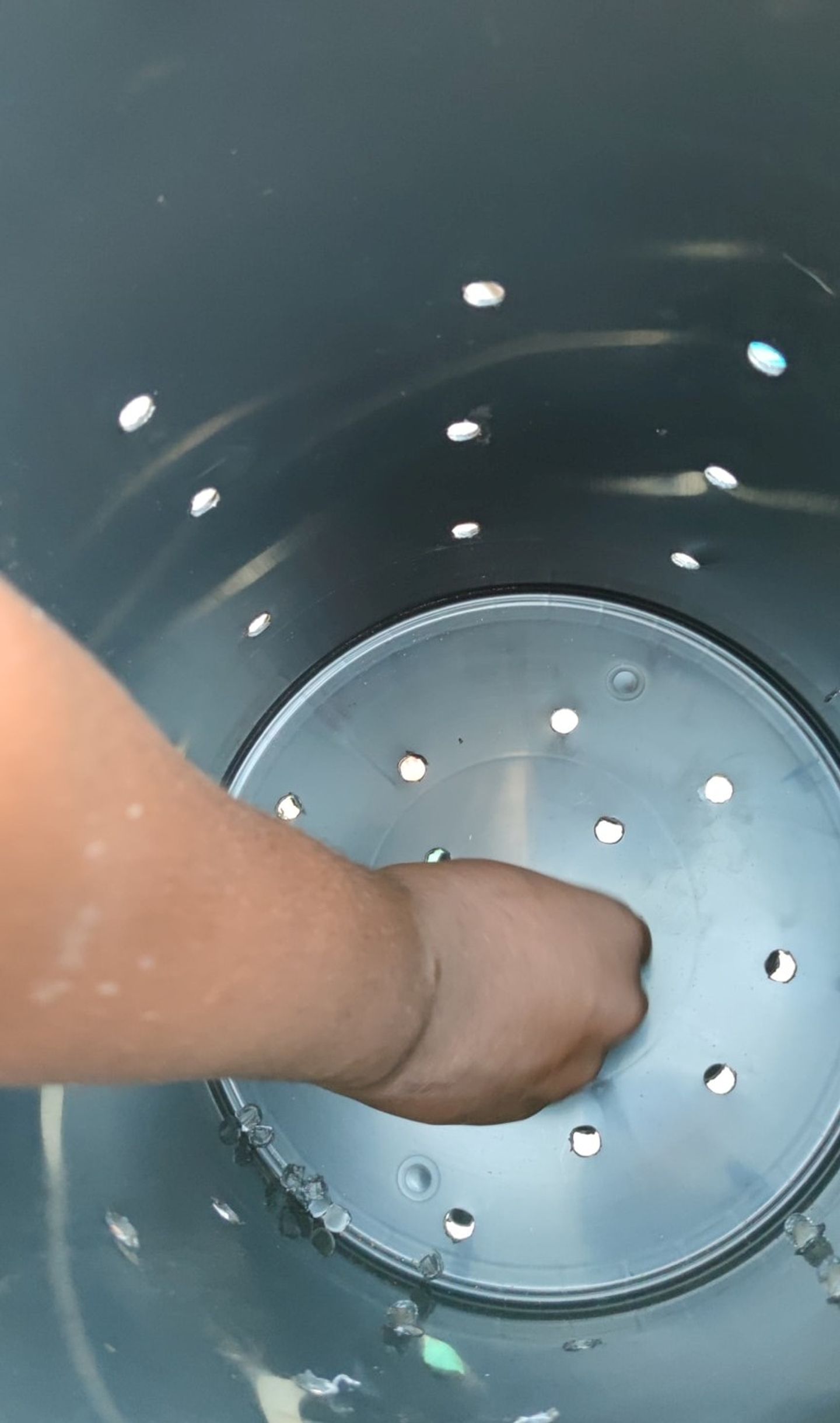 Removing all debris from the holes