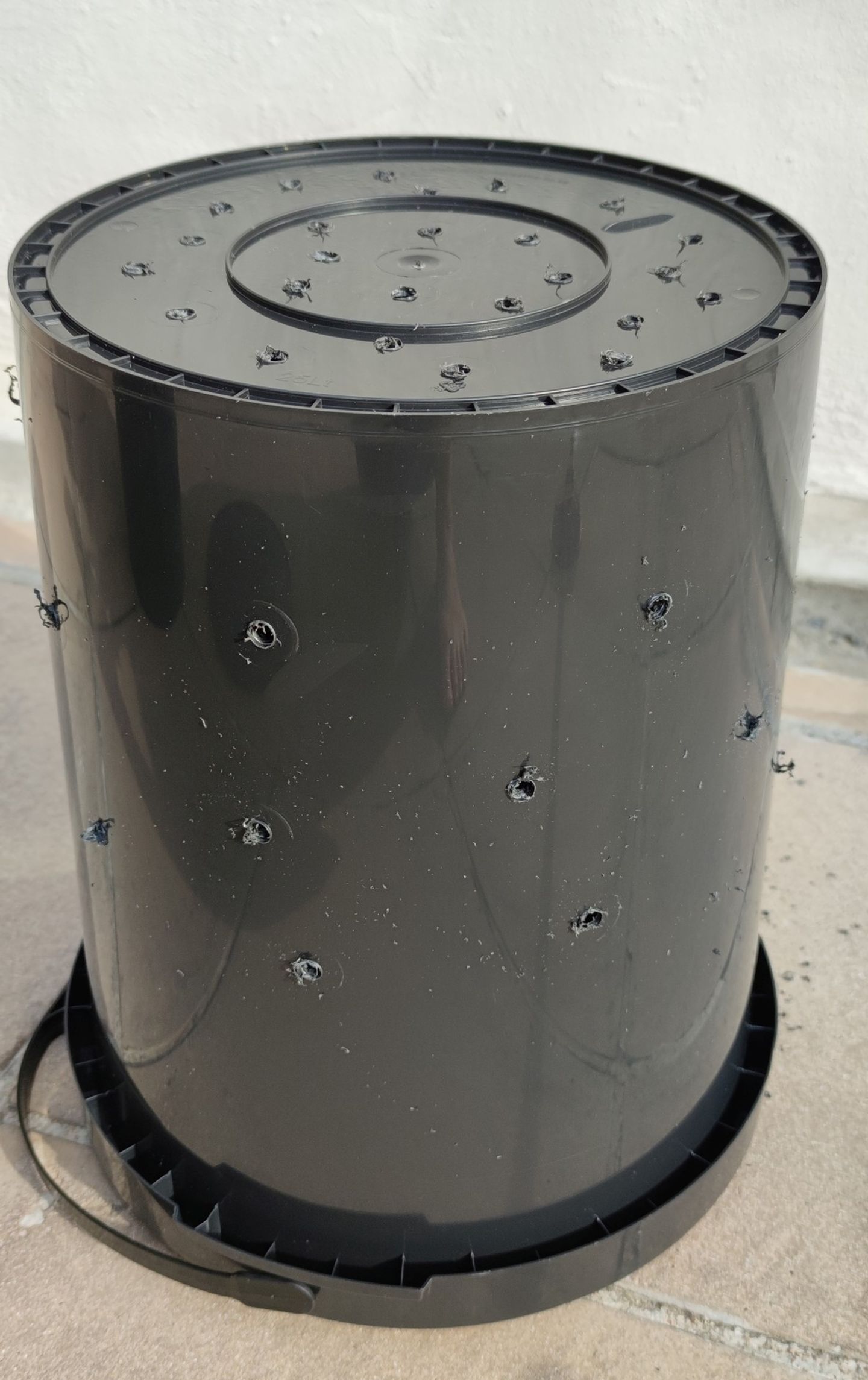 Holes in the inner bucket (here they have been drilled)