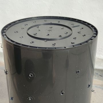 Holes in the inner bucket (here they have been drilled)
