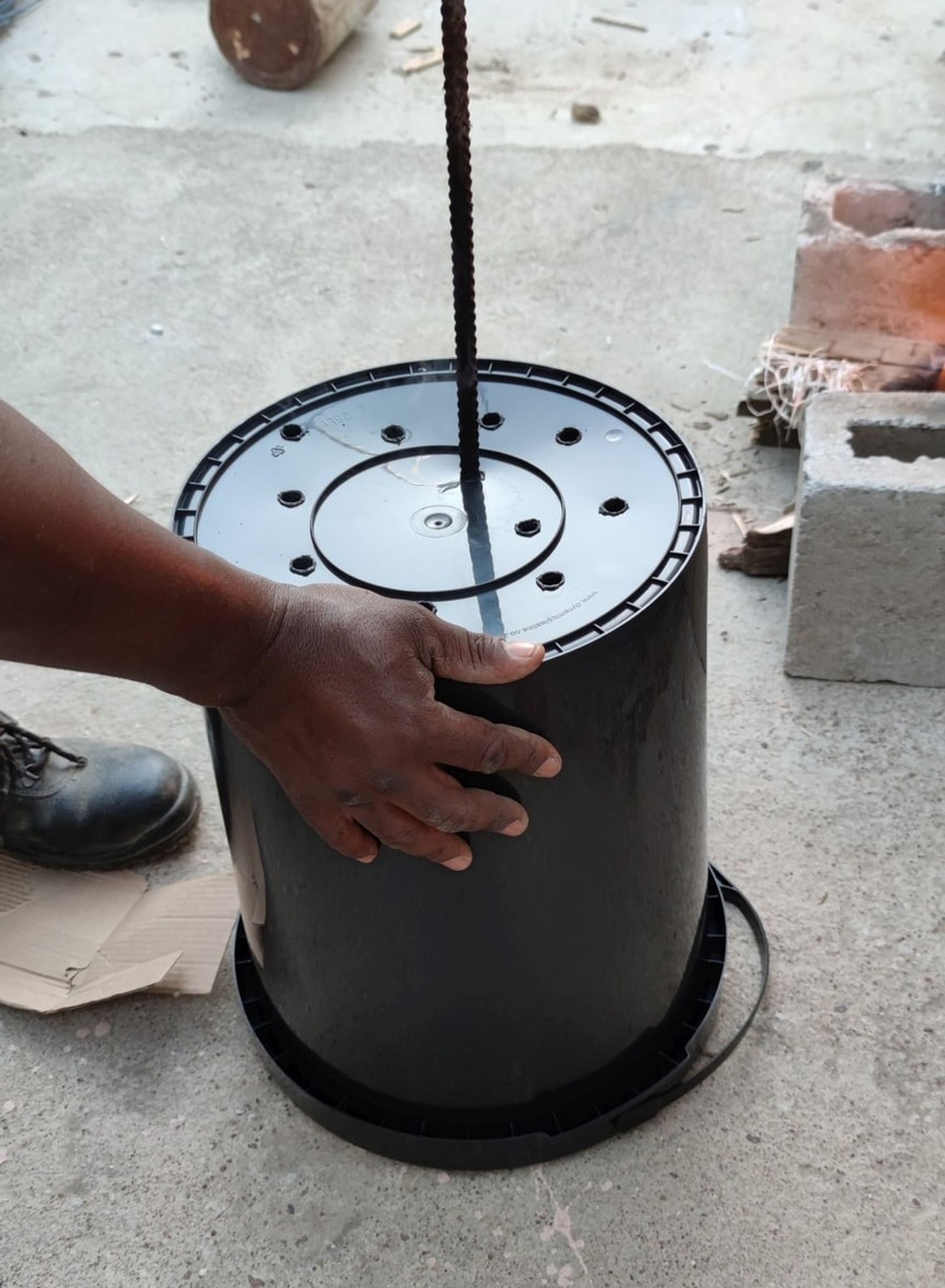 Burning holes with hot metal stick