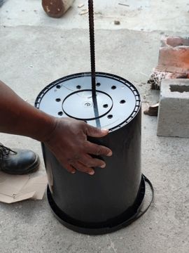 Burning holes with hot metal stick