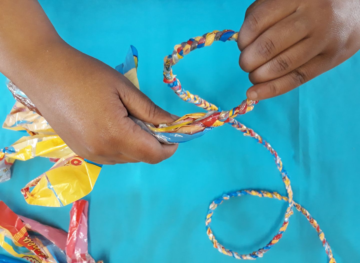 Tie an overhand knot before you run out of all the strands