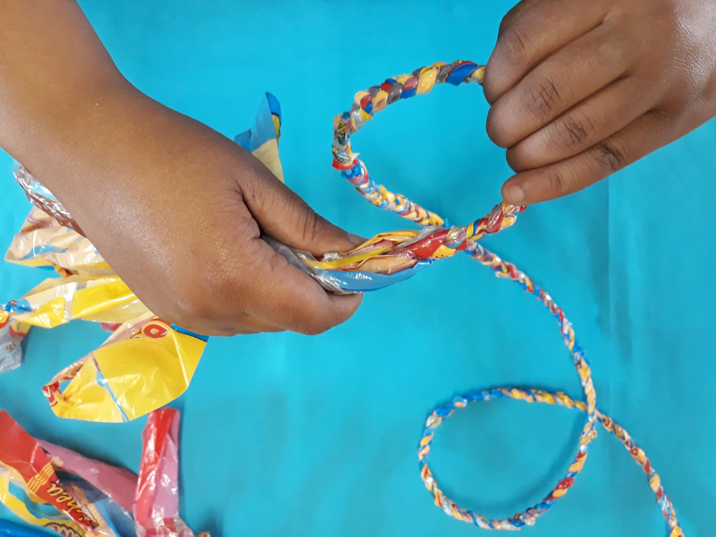 Tie an overhand knot before you run out of all the strands