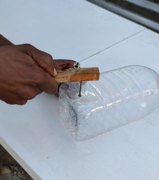 Make a hole in the bottle