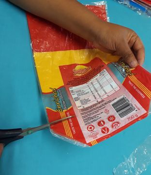 Cutting off the bottom straight above the fold line