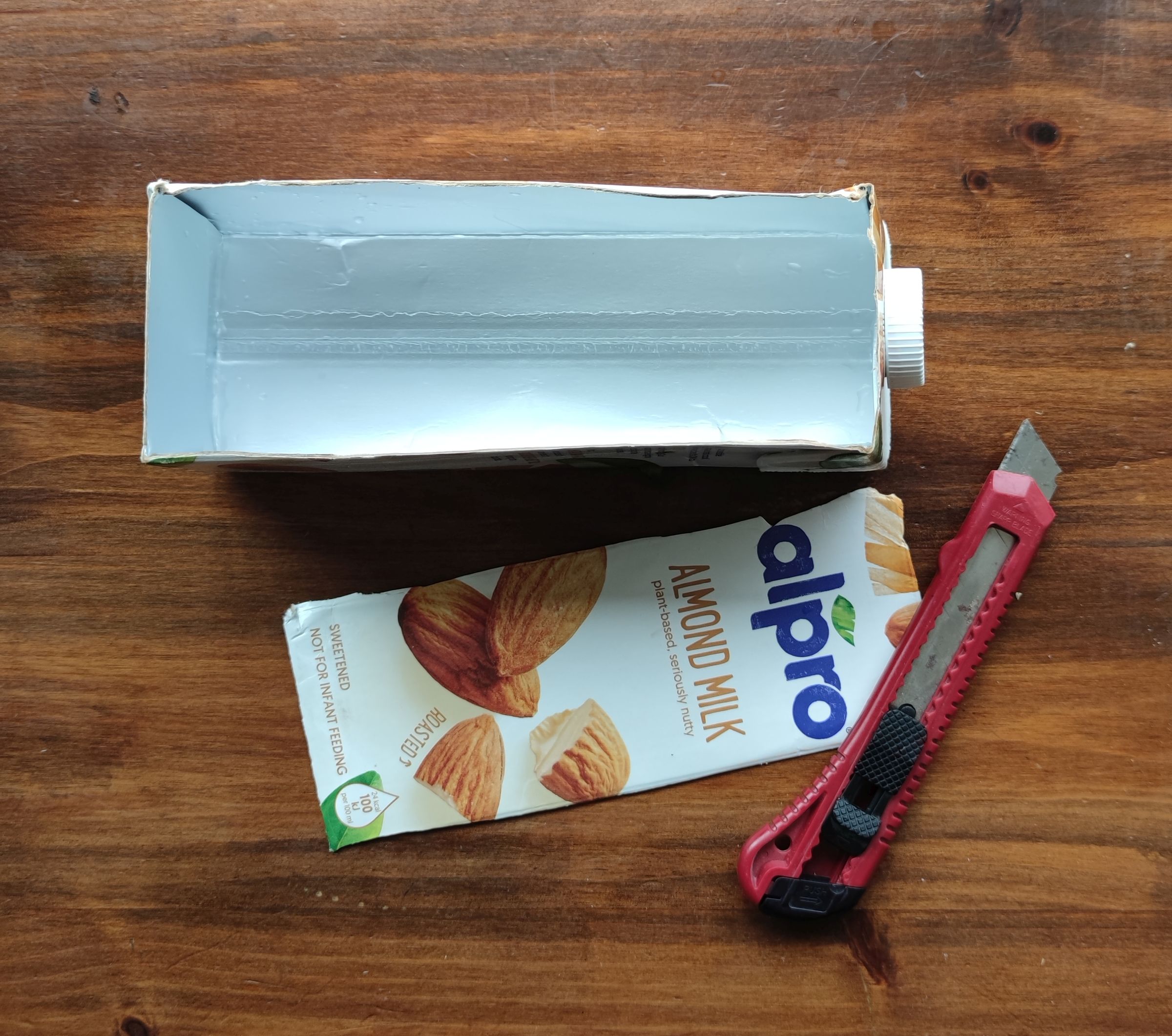 Cut off the top of the milk carton