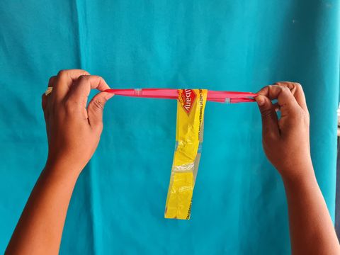 Form 2 rings into T shape