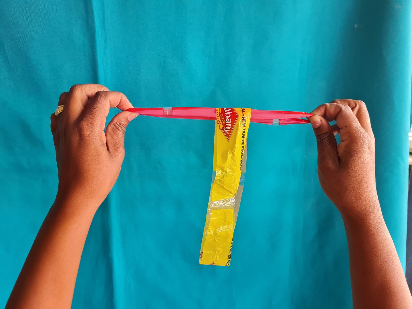 Form 2 rings into T shape