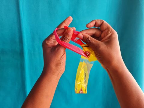 Thread the right hand part of the T through the left hand part of the T