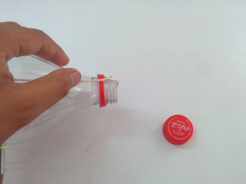 Tie the Thread on the Bottle Cap