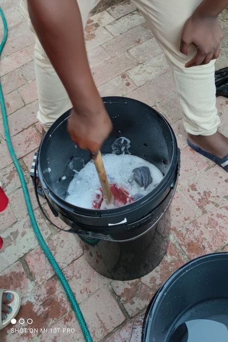 Someone using the self-built washing machine