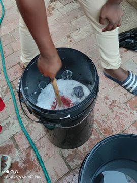 Someone using the self-built washing machine
