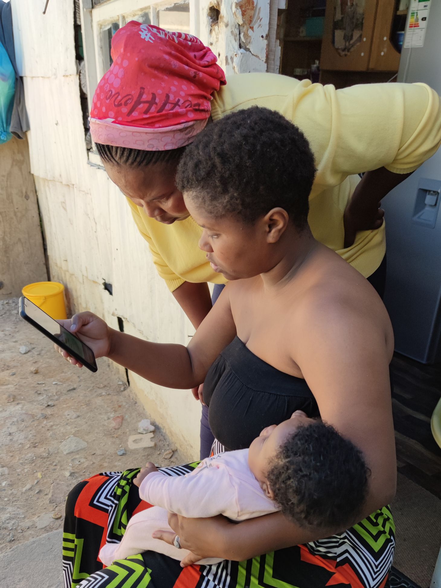 Women checking out the dooiy app