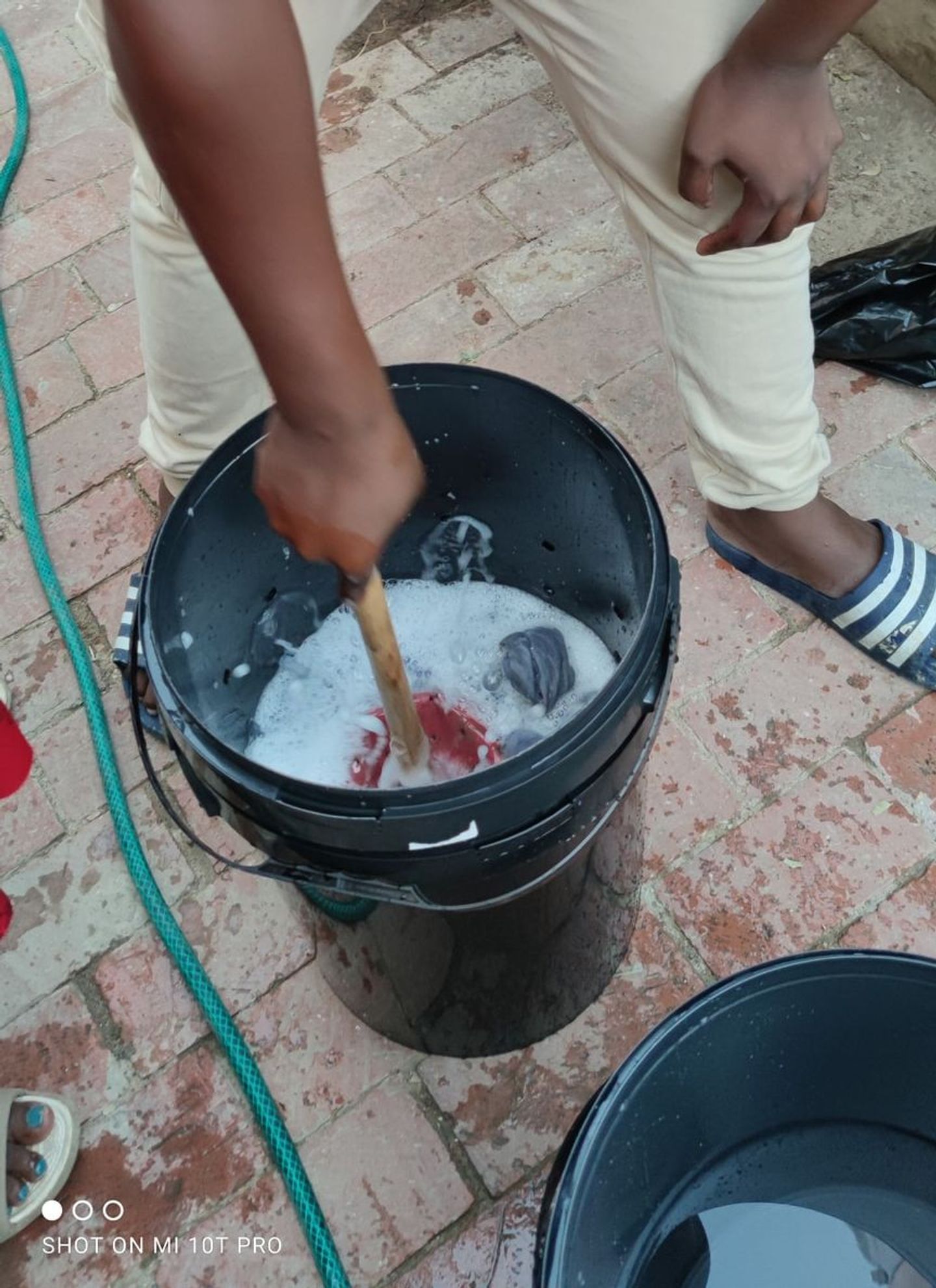 Someone using the self-built washing machine